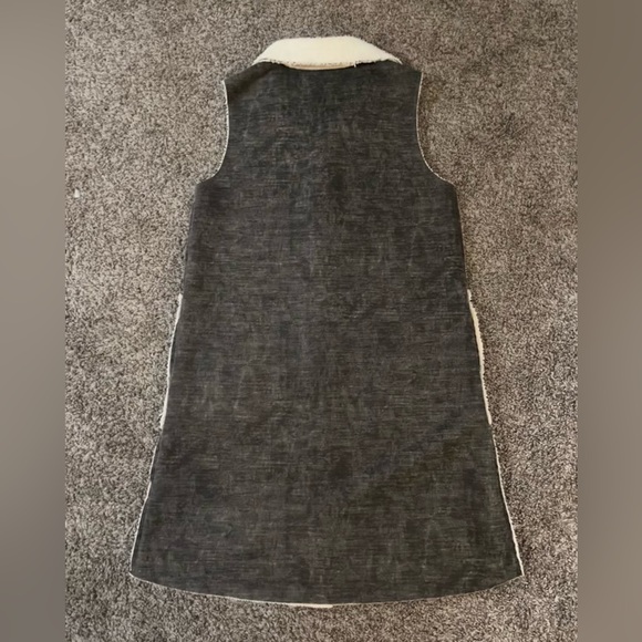 Dylan Los Angeles faux fur shearling lined long vest with pockets in dark grey. - Picture 6 of 16